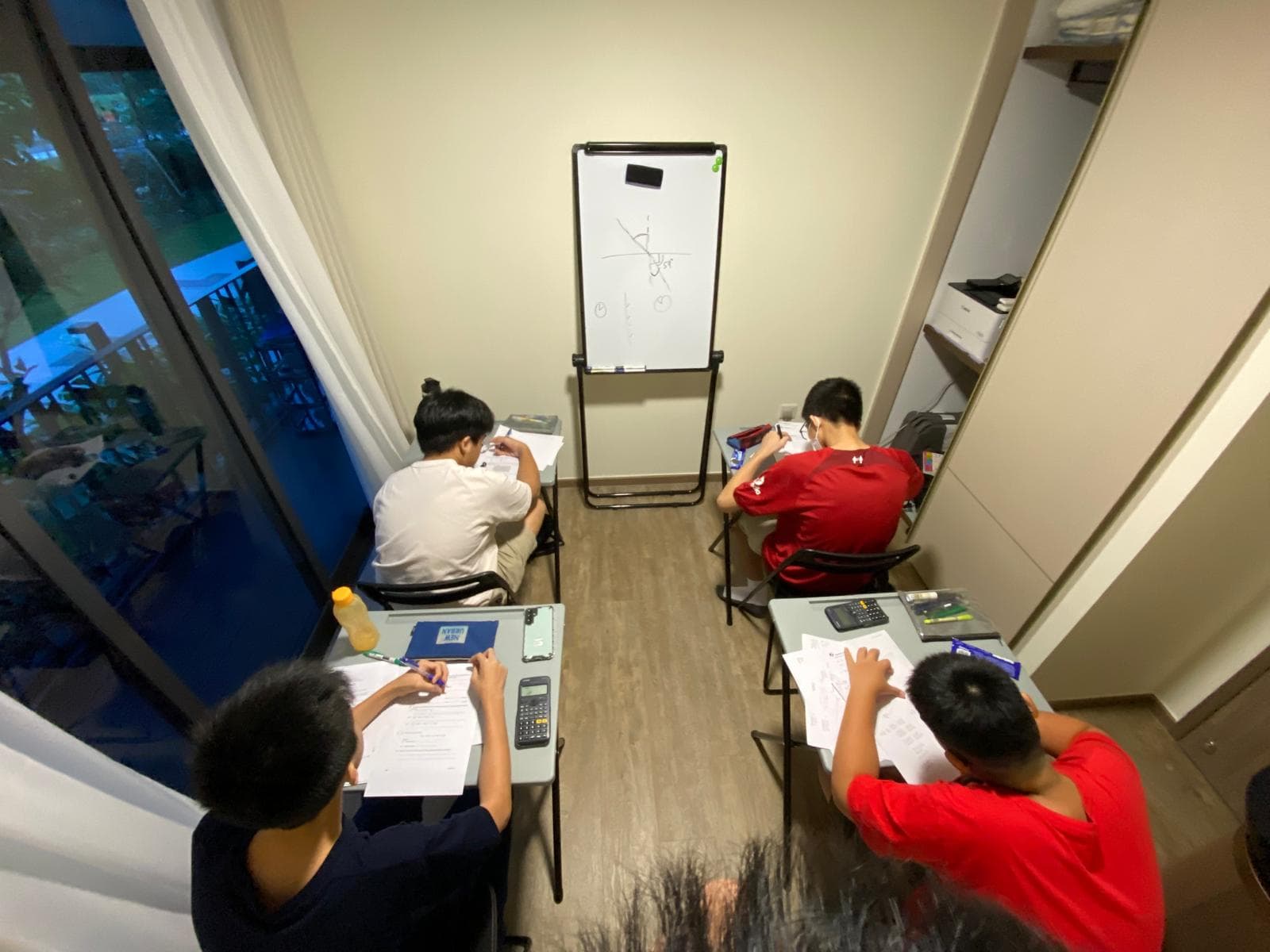 Students working in a small group lesson at JLearning